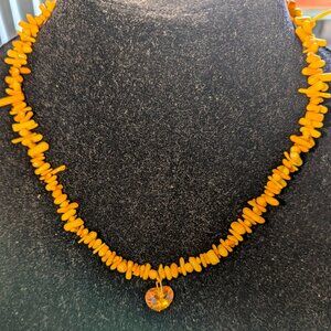 New amber mixed bead coral choker style necklace with a glass heart pendant